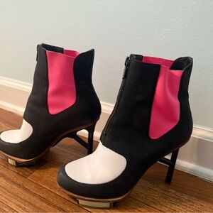 Elegant Black, Pink, and White Heeled Boots